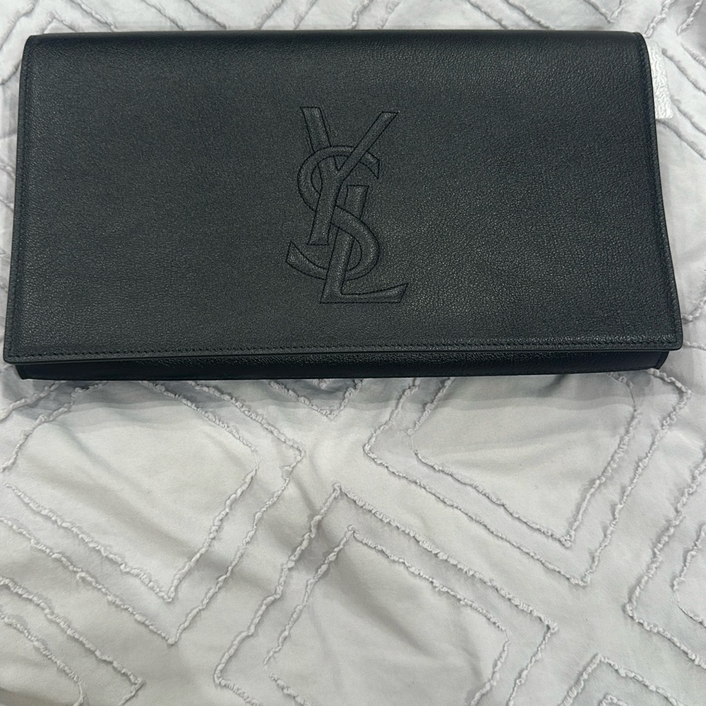Brand new YSL clutch. Never used! With tags. Has dust cover